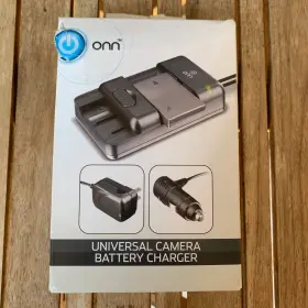 Ona18ca007 Onn Universal Camera Battery Charger Lithium-lon Dslr Camcorder Wall Car Adapter