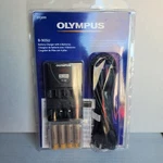 Olympus B90SU Nimh Quick Battery Charger For Digital Cameras B-90SU (200899). Fixed Price $49.99.