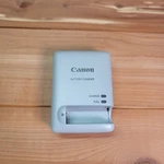 New Genuine Canon CB-2LBE Battery Charger For SD4500IS Ixus 510HS. Fixed Price $17.99.