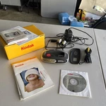 Kodak Camera Dock Model N137 With Ac Adapter And Usb Cable. Fixed Price $18.00.