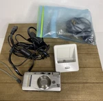 Fujifilm Finepix Series F700 6.2MP Digital Camera Silver W/ Cradle For Parts. Fixed Price $29.99.