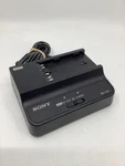 Sony BC-U1A Charger Fair Condition; Contact Cover Chipped. Fixed Price $99.00.