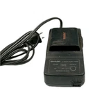 Genuine Oem Sharp Ac Adapter/battery Charger UADP-0241TAZZ W/ BATTERY........133. Fixed Price $40.00.