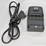 Hp Photosmart Quick Battery Charger Modal # L1815-60001. Fixed Price $5.64.