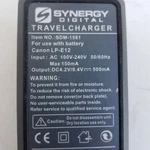 Synergy Digital SDM-1561 Travel Charger For Use With Battery Canon LP-E12. Fixed Price $18.91.