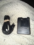 Casio Lithium Battery Charger Z037. Fixed Price $9.95.
