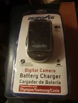 Digipower QC-500OSC Olympus/samsung/casio Camera Battery Charger (black). Fixed Price $10.00.