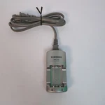 Samsung SBC-N1 Battery Charger Camera Power Supply. Fixed Price $11.99.