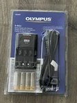Olympus B90SU Nimh Quick Battery Charger For Digital Cameras B-90SU (200899). Fixed Price $129.99.