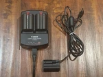 Canon Compact Power Adapter CA-PS400 Charger With DR-400 Dc Coupler & Batteries. Fixed Price $40.00.