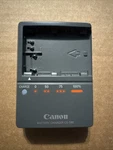 Genuine Canon CG-580 Battery Charger. Fixed Price $14.00.