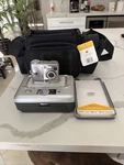 Kodak Easyshare C340 5MP 3X Zoom Silver Camera W/ Printer Dock Series Bag. Fixed Price $55.00.