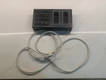 Varizoom (swit) SC-302 Battery Charger (w/power Cable) For NP1 Batteries (used). Fixed Price $80.00.