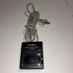 Minolta BC-200 Original Battery Charger With Power Cord. Fixed Price $11.99.