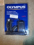 New Sealed Olympus Adapter D-7AC Charger, Power Supply. Fixed Price $11.99.
