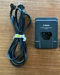 Genuine Canon CA-PS100 Compact Power Adapter Battery Charger. Fixed Price $19.97.