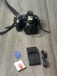 Sony Cyber-shot DSC-H50 9.1MP Digital Camera With Battery, Charger And Sd Card. Fixed Price $45.00.