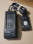 Quasar Battery Charger Adapter Model AC520 W/ Nuon NU55/ 15XL. Fixed Price $45.00.