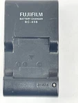 Fujifilm BC-45BU Battery Plug-in Wall Charger Some Scratches On It(new). Fixed Price $14.99.