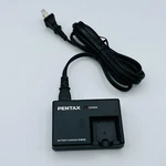 Pentax Digital D-BC63 Camera Battery Charger Adapter With Power Cord. Fixed Price $10.00.