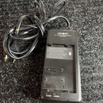 Geniune Minolta Model VAC-600E Output 6V 1.8A Power Supply Adapter. Fixed Price $12.50.