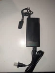 Smatree Ac/dc Adapter Model XVE90 Imput 100V Charging Cable. Fixed Price $10.99.