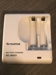 Fujifilm BC-NH01 Camera Travel Wallcharger Or Aaa Size Rechargeable Battery. Fixed Price $10.66.