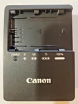 Geniune Canon LC-E6E Battery Charger Plus 1X LP-E6. Fixed Price $29.00.