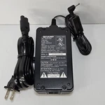 Genuine Sharp UADP-0340TAZZ Ac Adaptor With Power Cord 7V 1.3A. Fixed Price $24.95.