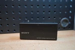 (l) Genuine Sony BCA-80 Battery Charge Adapter. Fixed Price $16.11.