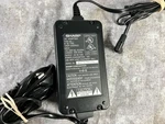 Genuine Sharp UADP-0303TAZZ Ac Adaptor With Power Cord 9V 09A. Fixed Price $14.95.