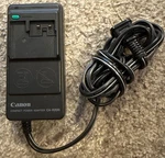 Genuine Canon CA-R200 Camera Power Adapter. Fixed Price $20.00.