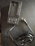 Canon CA-910 Oem Battery Charger (w Adapter Port) For DM-GL2 Only. Fixed Price $18.00.