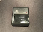 Konica Minolta BC-700 Lithium-ion Battery Charger Output 4.2V 650MA. Fixed Price $24.95.