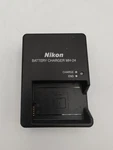 Used Oem Nikon NH-24 Battery Charger No Or Cable Free Shipping. Fixed Price $11.99.