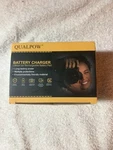 Qualpow Two LP-E10CAMERA Battery With Charger, New,. Fixed Price $20.00.