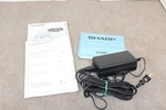 Sharp Ac Adapter 15W AL-A111U Charger And Manual. Fixed Price $12.95.
